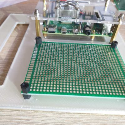 Raspberry Pi 4 + PCB on support Raspberry Pi 4 + PCB mounted on the supporting board